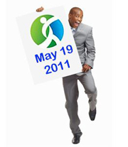 Photo of guy holding Ability Axis Employment Expo sign